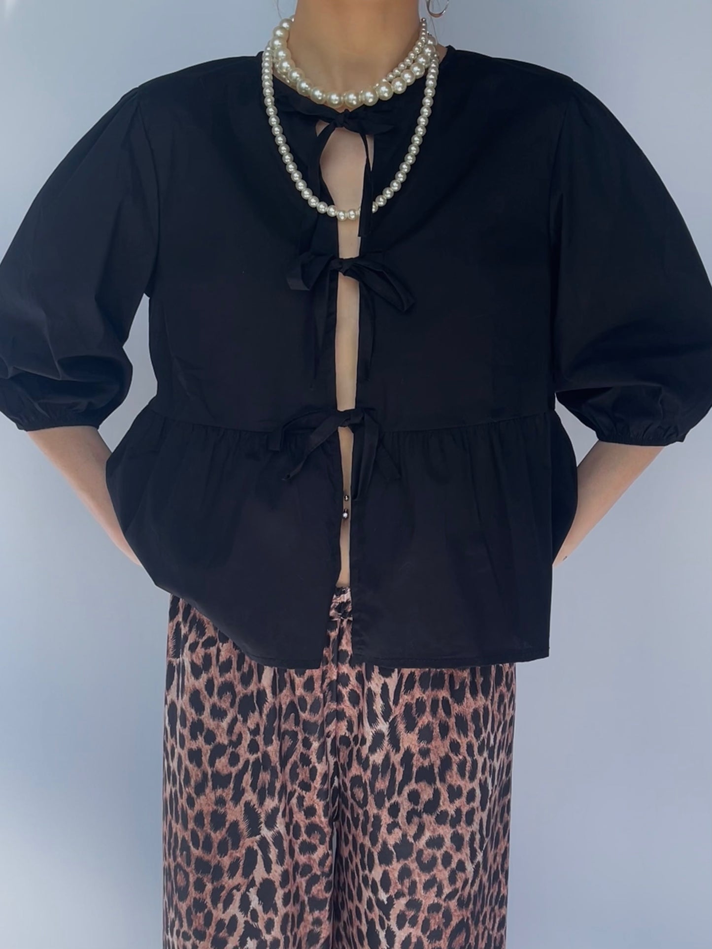 Blouse à noeuds noire