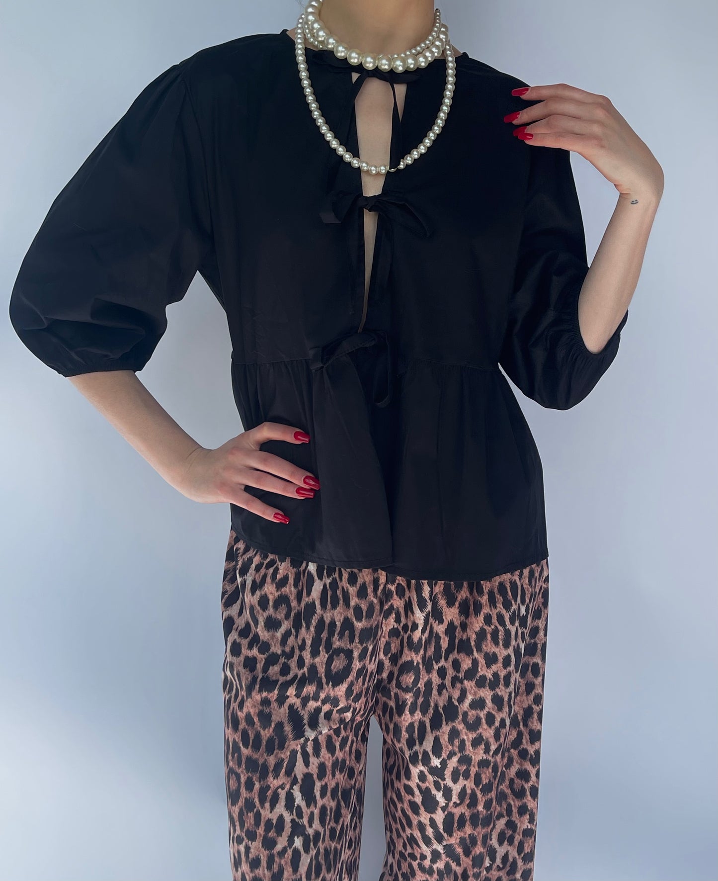 Blouse à noeuds noire